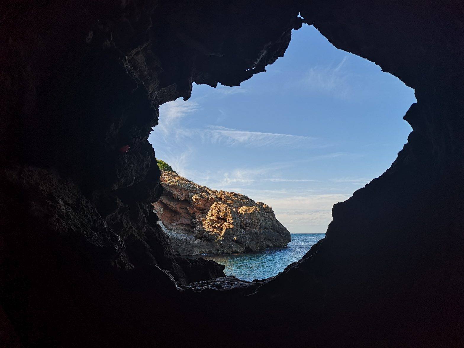 The entrance to Cova Tallada (Curved Cave) in Costa Blanca, Spain