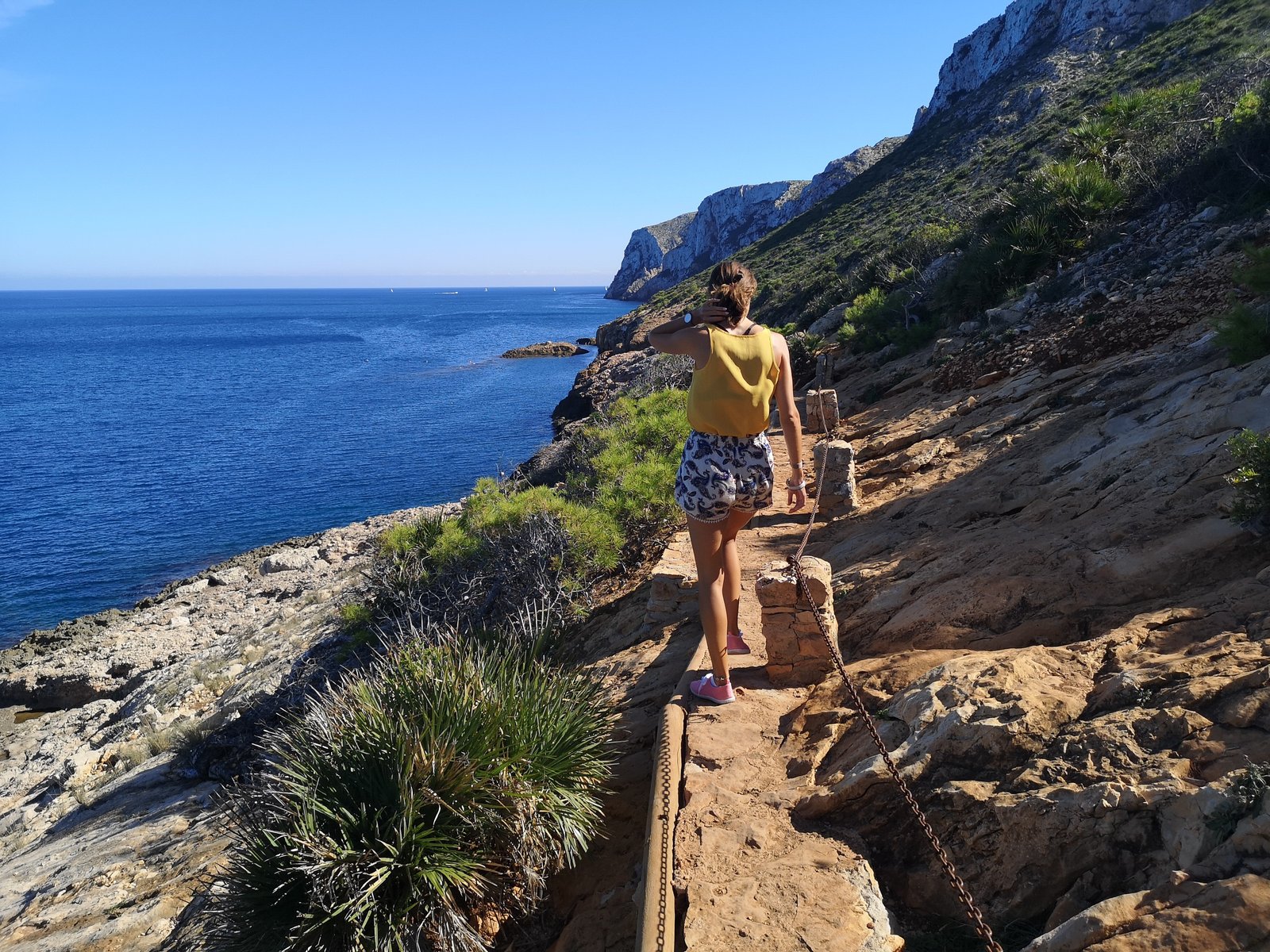 Hiking to Cova Tallada on a narrow path