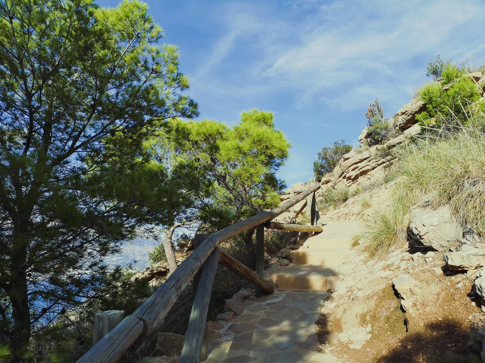 The stepts to the second viewont on Camino del Faro in Serra Gelada, Spain