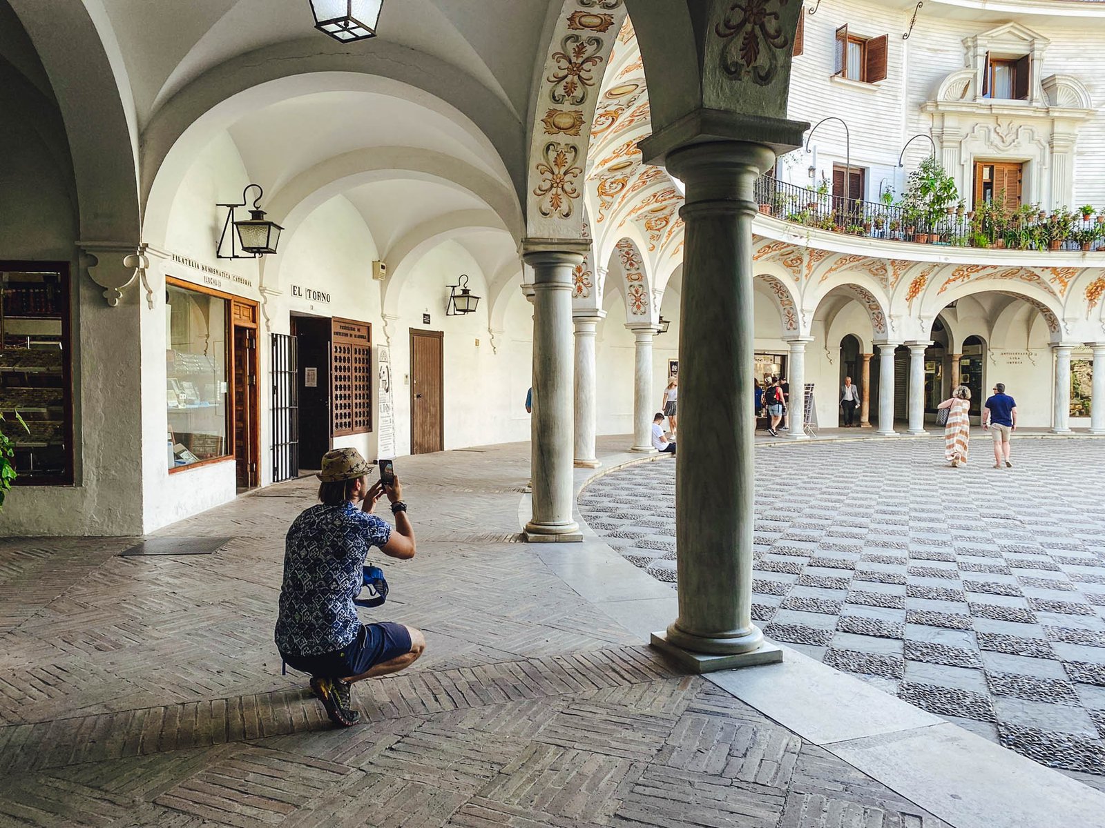 Taking a photo at Plaza del Cabildo, Seville