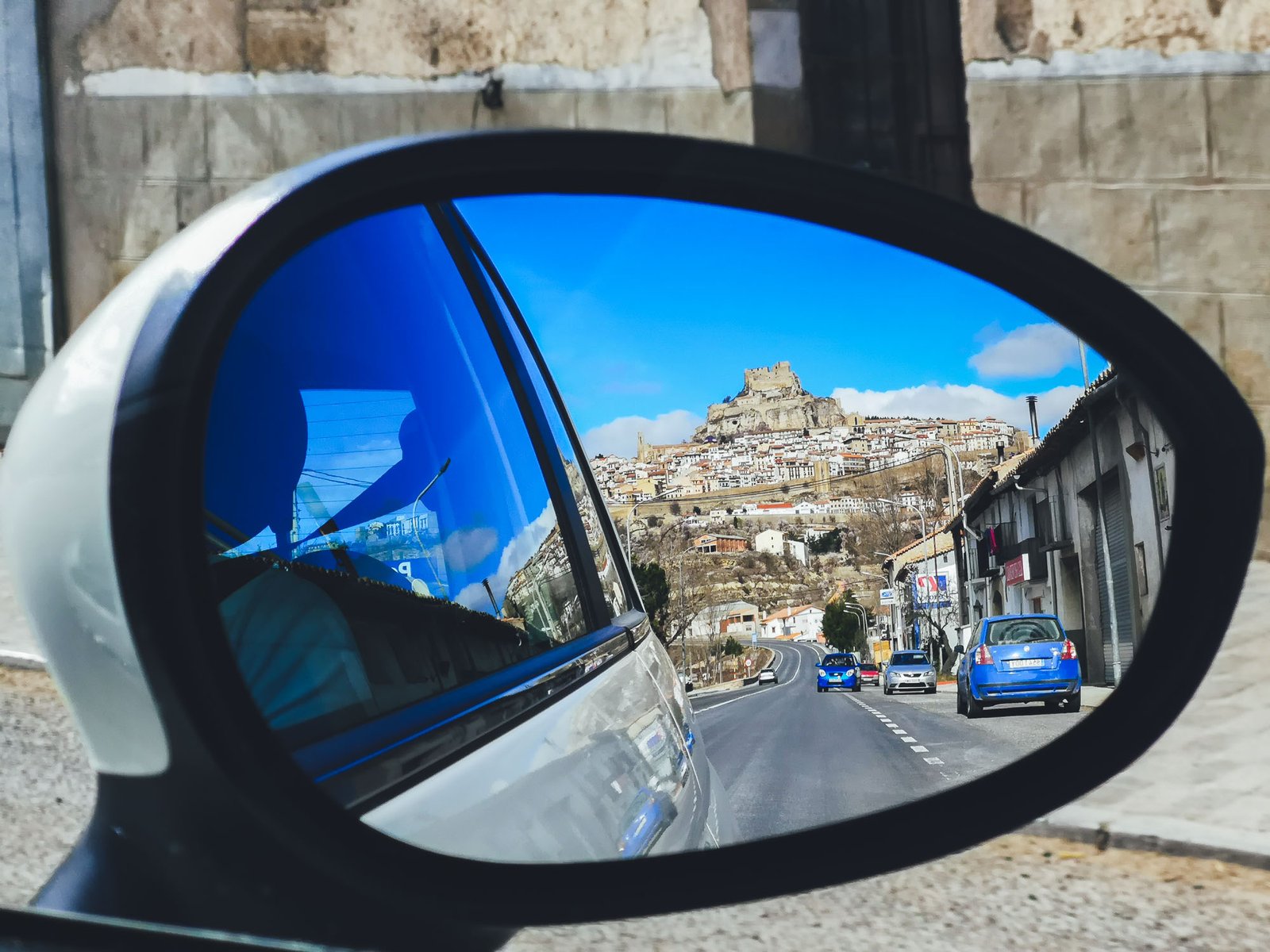 Morella castle in car mirror, Spain