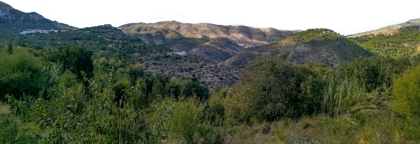 Benimaurell in the background of Sierra Carrascal de Parcent in La Vall de Laguar in Marina Alta, Spain